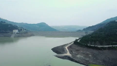 Dam drone view. Low water level in dam. Drought in reservoir. Aerial view of dam Stock Footage 234841290