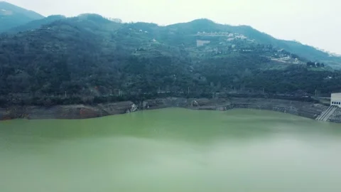 Dam drone view. Low water level in dam. Drought in reservoir. Aerial view of dam Stock Footage 234841365