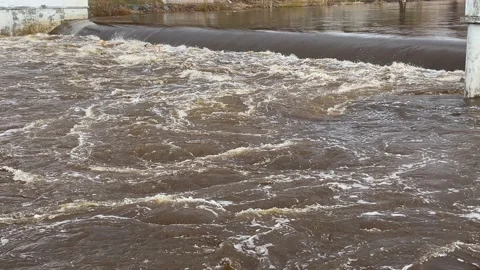 Dam with flowing water on river. Stock Footage 238587946