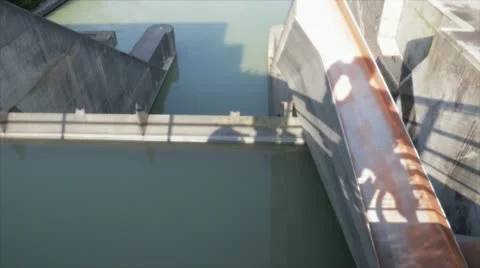 Dam in high mountain lake Stock Footage