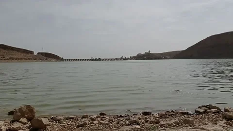 Dam includes water,rocks and sky timelaps from (M'sila-algeria) Stock Footage 153490644