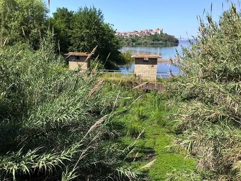 Dam on the lake blocking the river Stock Photos