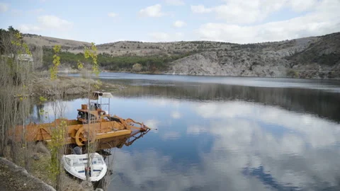 Dam lake cleaning machine or boat, Wide angle view Stock Footage 225258896