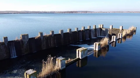 Dam Lake under blue cloudy sky aero Stock Footage 122950753