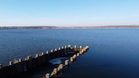 Dam Lake under blue cloudy sky aero Stock Footage 122951633
