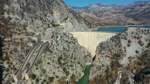 A dam operating hydroelectric power station on the river.  Stock Footage 233607386