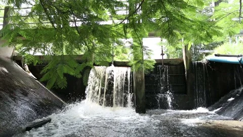 Dam overflowing in a canal  Stock Footage 143648390