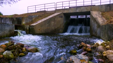 Dam on river and waterfall. 4k time lapse. Stock Footage 155354368