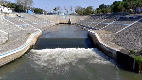 Dam river on the edge of town Video stock 288854548
