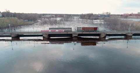 Dam on River Reveal of Flooding Spring Water Stock Footage 89012866