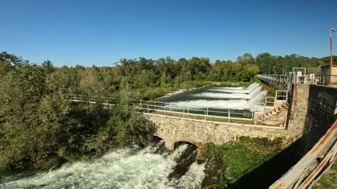 Dam on the river with small waterfalls Stock Footage 252771374