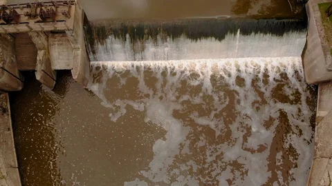 Dam on the river. Waterfall. Strong current. Aerial filming Video stock 108354467