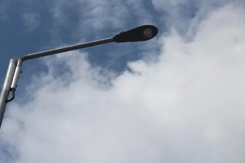 Dam road lights with cloudy sky on background Foto stock