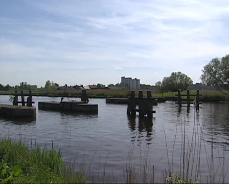 Dam sluice in Ringvaart (ring canal)  Haarlemmermeer, built for military use Stock Footage 33066085