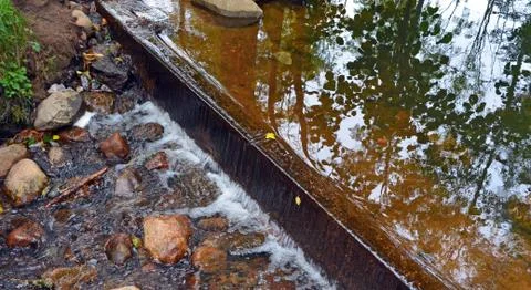 Dam on the small river Stock Photos