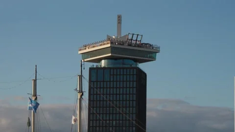 A’DAM Tower rooftop platform under clear blue sky Stock Footage 317734973