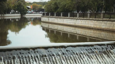 Dam on the urban river Stock Footage 57782945