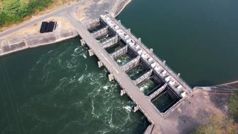 Dam water flow river bridge from hydroelectric energy plant reservoir stati.. Stock Footage 306546602