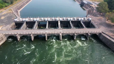 Dam water flow river bridge from hydroelectric energy plant reservoir stati.. Stock Footage 306546764