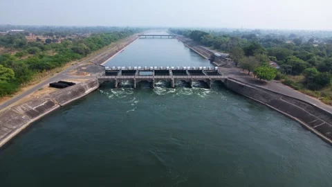 Dam water flow river bridge from hydroelectric energy plant reservoir stati.. Stock Footage 306546765
