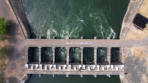 Dam water flow river bridge from hydroelectric energy plant reservoir stati.. Stock Footage 306546979