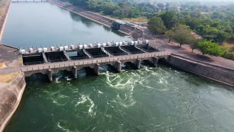 Dam water flow river bridge from hydroelectric energy plant reservoir stati.. Stock Footage 306546980