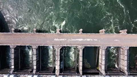 Dam water flow river bridge from hydroelectric energy plant reservoir stati.. Stock Footage 306546994