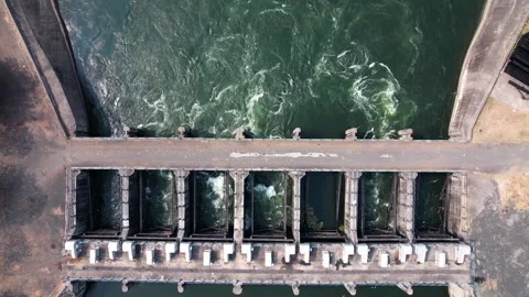 Dam water flow river bridge from hydroelectric energy plant reservoir stati.. Stock Footage 306547065