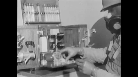 Damage control personnel use an air sampling kit aboard a United States Navy Stock Footage 99105256