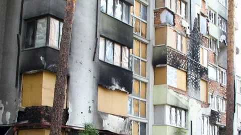 Damage to a house a year after the missile attack, Irpin, Ukraine Stock Footage 246856565