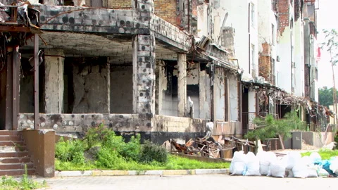 Damage to a house a year after the missile attack, Irpin, Ukraine Stock Footage 246856770