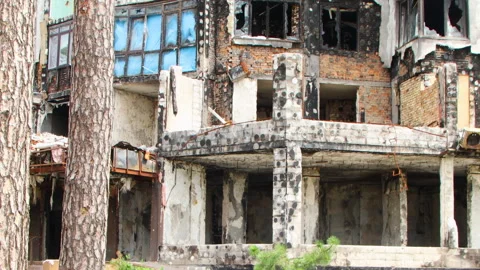Damage to a house a year after the missile attack, Irpin, Ukraine Stock Footage 246856893