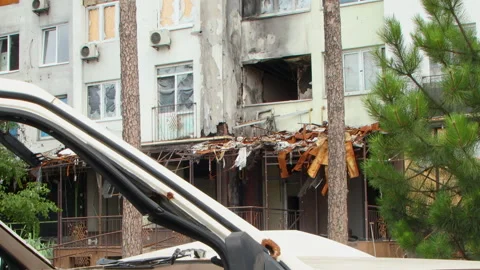 Damage to a house a year after the missile attack, Irpin, Ukraine Stock Footage 246860467