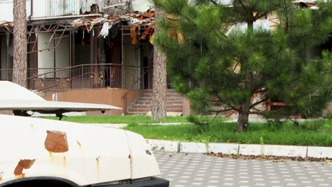 Damage to a house a year after the missile attack, Irpin, Ukraine Stock Footage 246860585