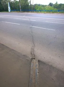 Damage to the road on the bridge Stock Photos