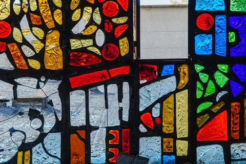Damage stained glass window with block pattern Stock Photos