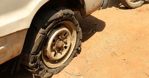 Damage tire on the side of the road Video stock 75964754