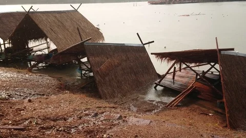 Damaged and broken collapsed hut or houseboat after rainstorm Stock Footage 91902202