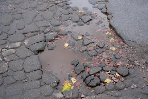 Damaged asphalt road surface 스톡 사진