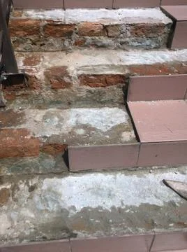 Damaged beige steps Stock Photos