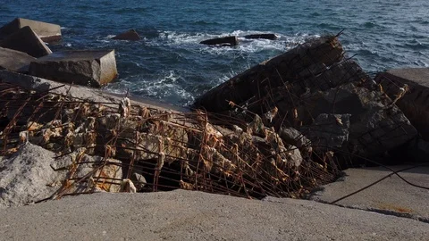 Damaged breakwaters because a storm. Stock Footage 125575101