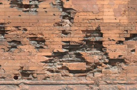 Damaged brick wall Stock Photos