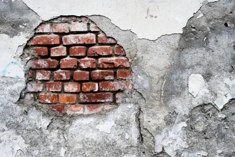 Damaged brick wall Stock Photos