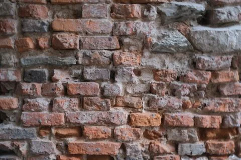Damaged brick wall Stock Photos