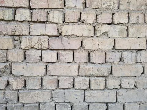 Damaged brick wall Stock Photos