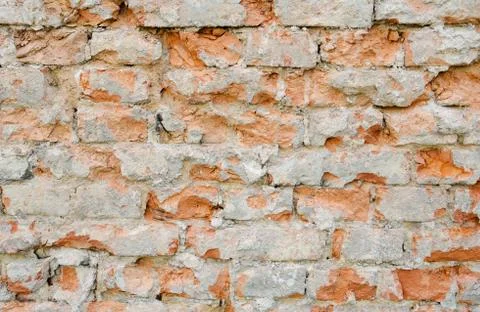 Damaged brick wall texture Stock Photos