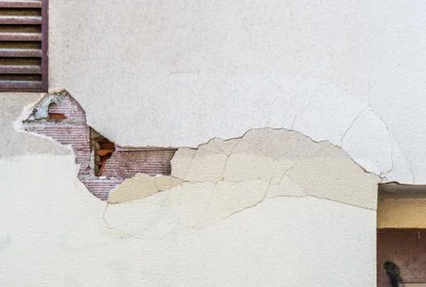 Damaged building facade is falling Stock Photos