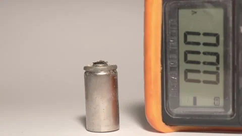 Damaged Capacitor Voltage Check with Multimeter Stock Footage 319494050