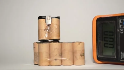 Damaged Capacitor Voltage Check with Multimeter Stock Footage 319494073