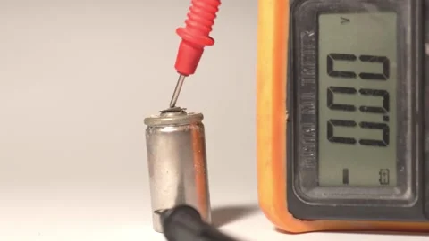 Damaged Capacitor Voltage Check with Multimeter Stock Footage 319494095